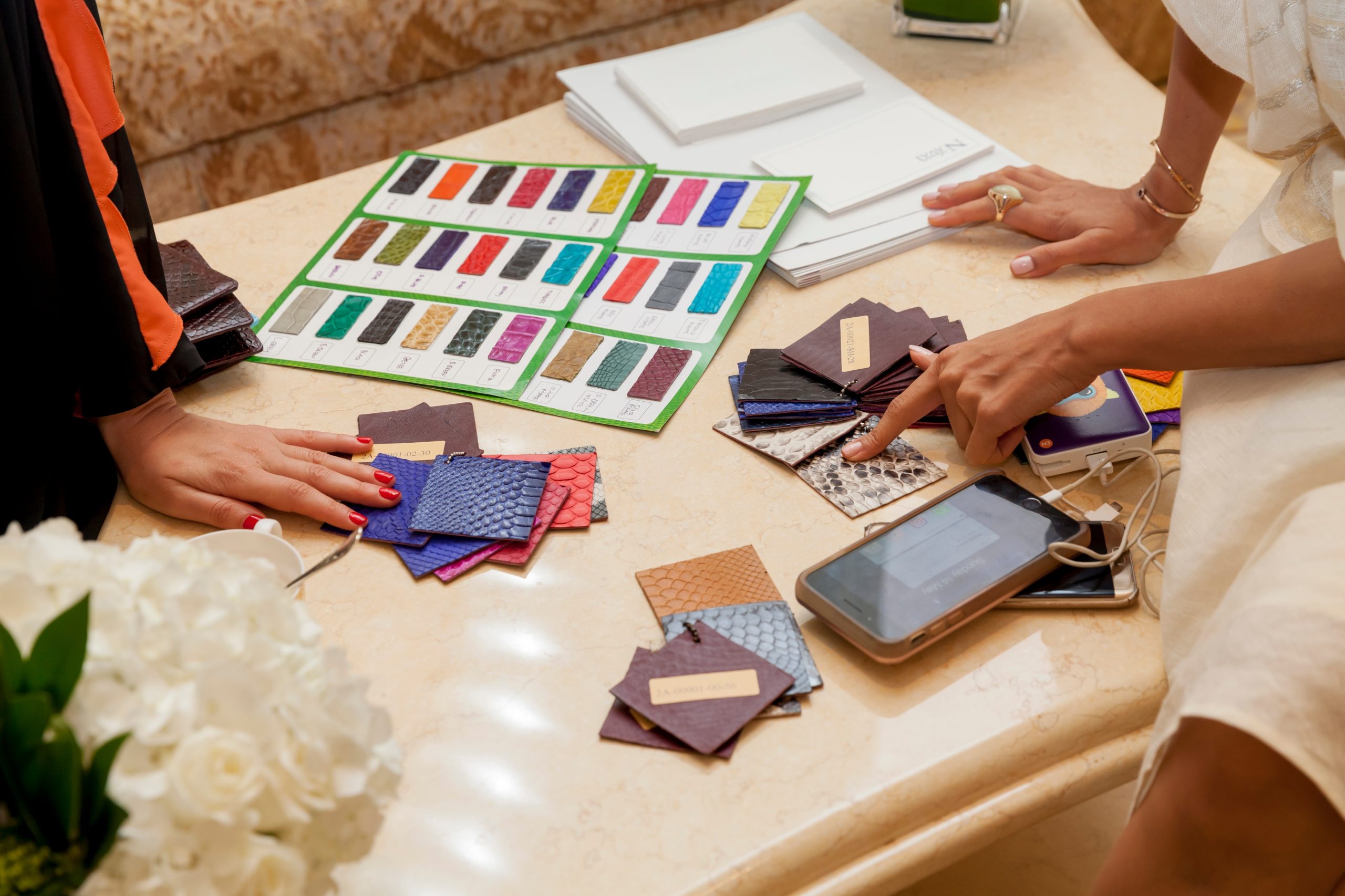 woman-choosing-the-color-for-the-custom-made-leath-2023-11-27-05-11-32-utc